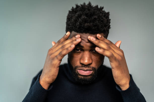 istock Portrait of a young man on a gray background 1424925319