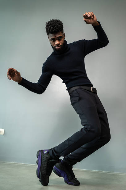 istock Portrait of a young man dancing 1424925358