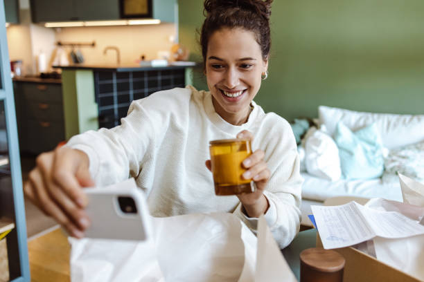 Female influencer taking a selfie with ordered item