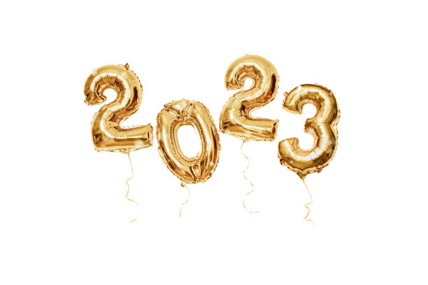Christmas and New Year 2023 background with gold festive balloons isolated on white backdrop Christmas and New Year 2023 background with gold festive balloons isolated on white backdrop new year photos stock pictures, royalty-free photos & images
