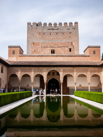 Granada, Spain – May 30, 2022: The Court of the Myrtles in the central part of the Comares Palace