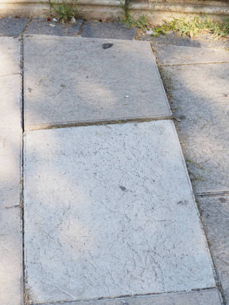 istock uneven sidewalk tiles. Potholes, insecurity and risk, hd image 1424950230