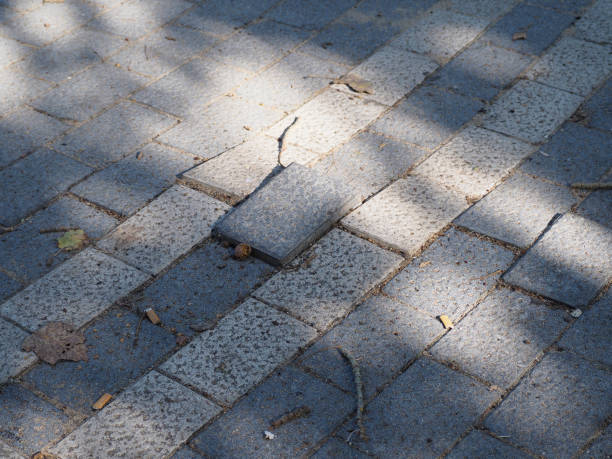 istock uneven sidewalk tiles. Potholes, insecurity and risk, hd image 1424950248