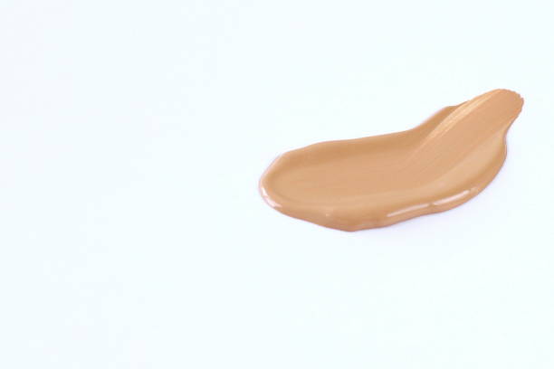 istock Beige tonal cream sample on white 1424953638