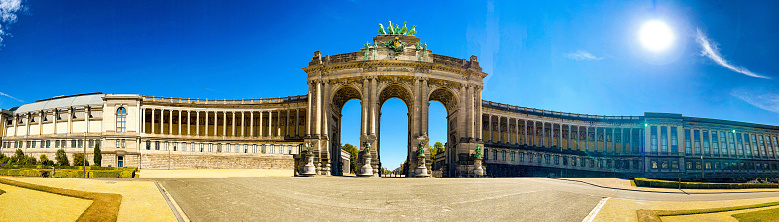 Panoramic view of the triumphal arch with triple arch in the center of the Cinquantenaire Park Brussels