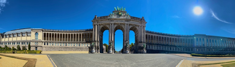 The Cinquantenaire Park, The monumental triple arch Brussels in the summer with beautiful blue sky