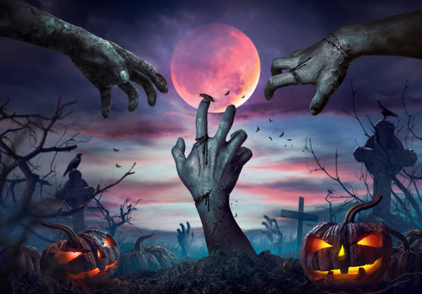 istock Zombie hand rising in dark Halloween night. 1424957696