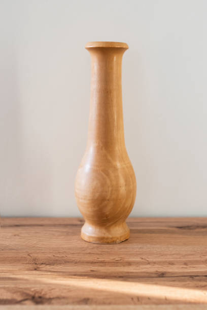 istock Empty wooden vase for flowers bouquet 1424958462