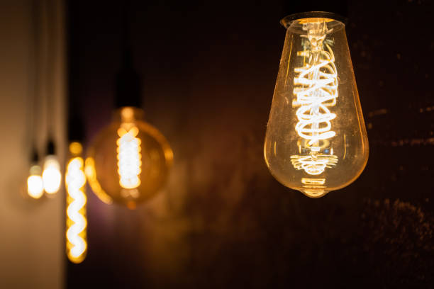 Light bulbs in retro style, edison electrical lamps, loft home interior stock photo