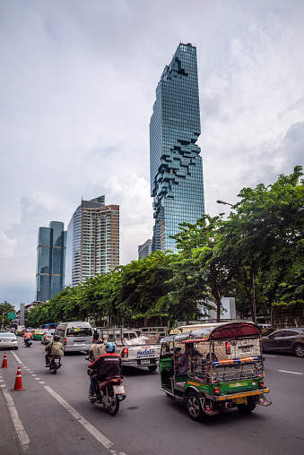 Ho Chi Minh City, Nam Bo, Vietnam - December 25, 2019: The traffic and motorcycle ride in the city of Saigon in Vietnam