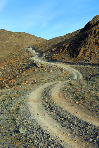winding mountain road leading up