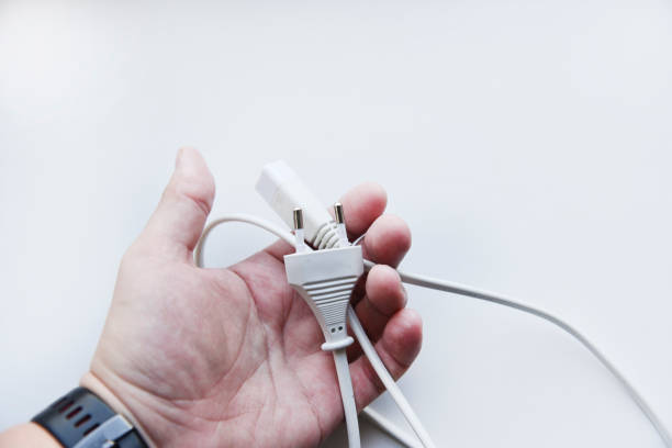 istock White power cord on a white background. Electric cord on a white background. 1424963390