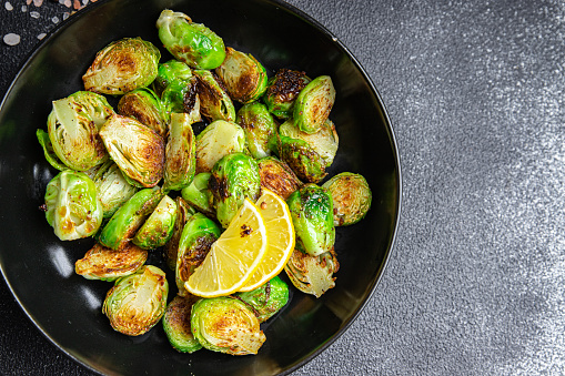 Brussels sprouts fried vegetable healthy meal food snack diet on the table copy space food background rustic top view keto or paleo diet