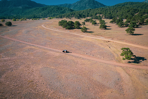Aerial view of adventure driving in the outdoors in plain