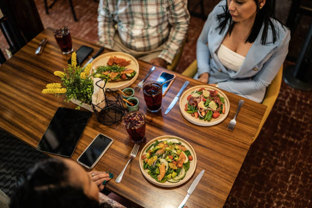 Coworkers having lunch together in a restaurant