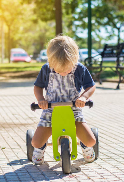 istock 2 year old blond toddler playing 1424976713