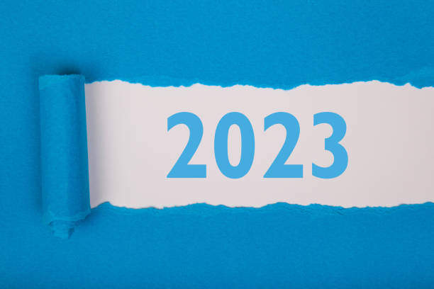 istock Torn Paper With Happy New Year 2023 On White Background 1424978387