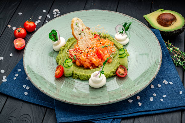istock Salmon tartare with avocado puree 1424980000