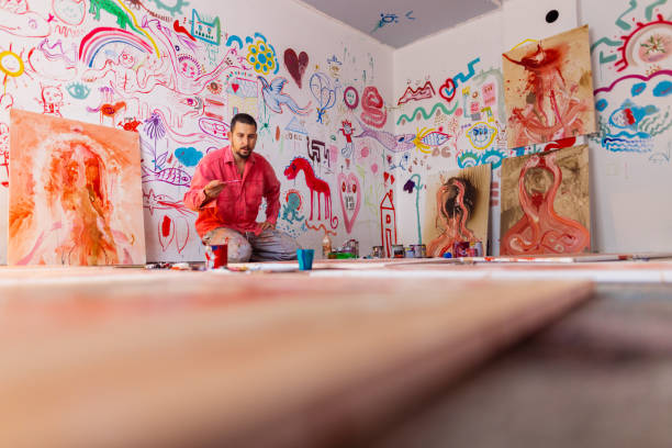 istock Artist in action in his atelier 1424980423