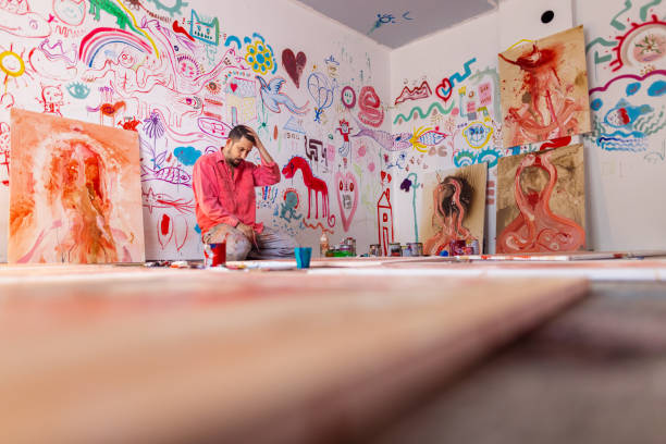 istock Artist in action in his atelier 1424982020