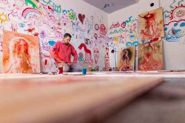 istock Artist in action in his atelier 1424982619
