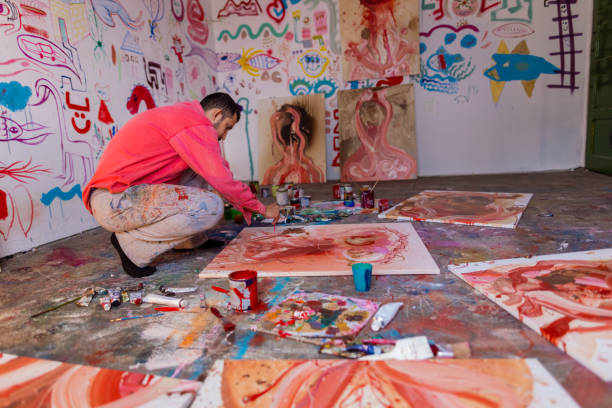 istock Artist working on painting 1424982973