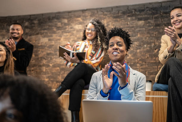 istock People clapping in a seminar 1424983212