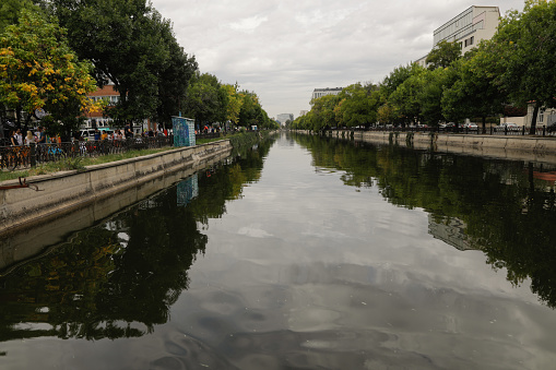 Bucharest, Romania - September 17, 2022: Dambovita river in the centre of Bucharest.