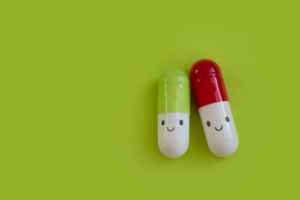 istock Pills on a colored background, smile 1424984781