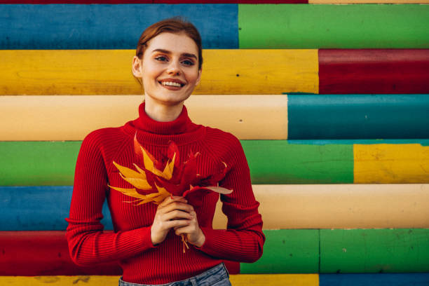 Beautiful woman enjoying autumn