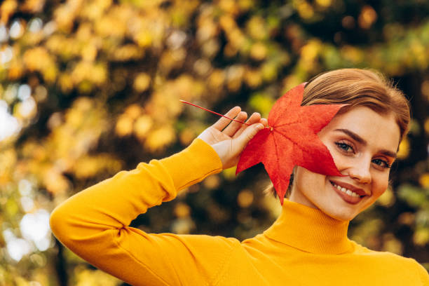 Beautiful woman enjoying autumn