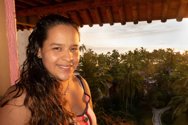 istock young woman smiles 1424991131