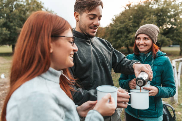 istock Three friends hiking in the forest 1424993265