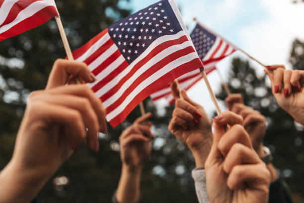 American flags raised for holiday celebrations American flags Happy Veterans Day, Labour Day, Independence Day concepts. thank you veterans day stock pictures, royalty-free photos & images