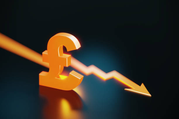 Orange Colored British Pound Symbol And Arrow Symbol On Black Background Orange colored British pound symbol and arrow symbol sitting on black background. Horizontal composition with copy space. british falling pounds stock pictures, royalty-free photos & images