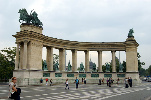 Colonnade of the Millennium Monument, topped with the bronze chariot with female charioteer holding a palm branch, symbolizing Peace, in the Heroes' Square, Budapest, Hungary