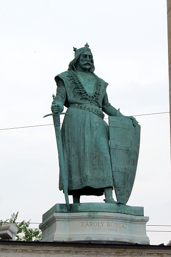 Bronze statue of Charles I of Hungary, aka Charles ( Karoly ) Robert, 14th century King of Hungary and Croatia, one of the statues of historical personalities at the Millennium Monument, in Heroes Square, Budapest, Hungary