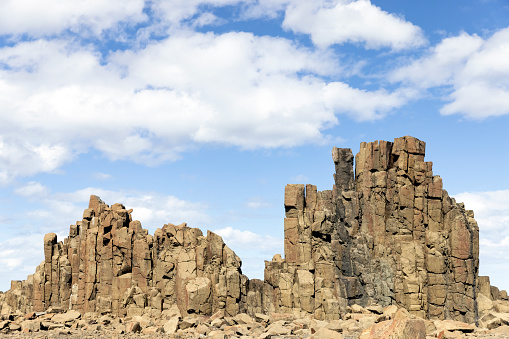 Basaltic volcanic columns, Bongo NSW Australia, background with copy space, full frame horizontal composition