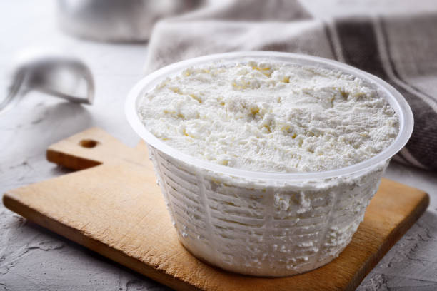 istock Ricotta cheese or cottage cheese, close-up. 1425008420