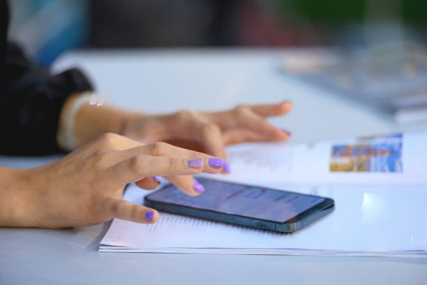 istock Woman surfing the net on her smartphone 1425012884