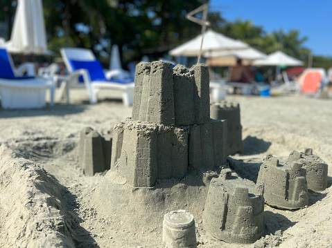 Sand Castle on Beach with background ocean