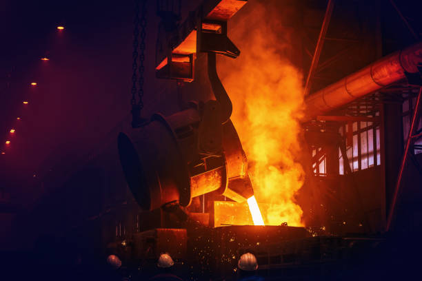 Iron casting in foundry. Metallurgical plant. Liquid metal stock photo