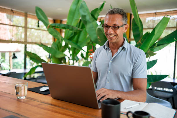 istock Man working on laptop in the office 1425033828