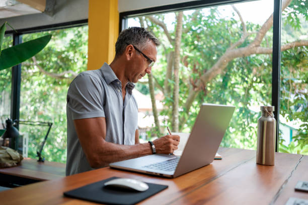 Man working on laptop in the office