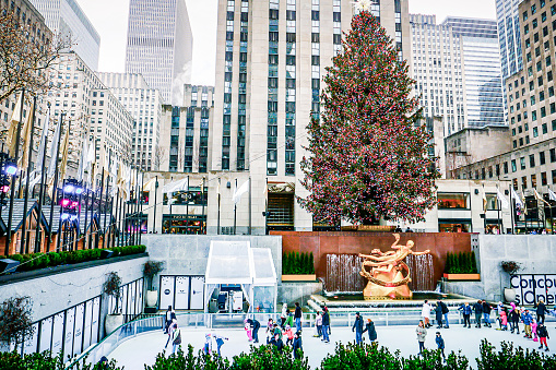 Rockefeller Tree and people ice skating underneath, in midtown New York City. Photographed on December 18, 2021