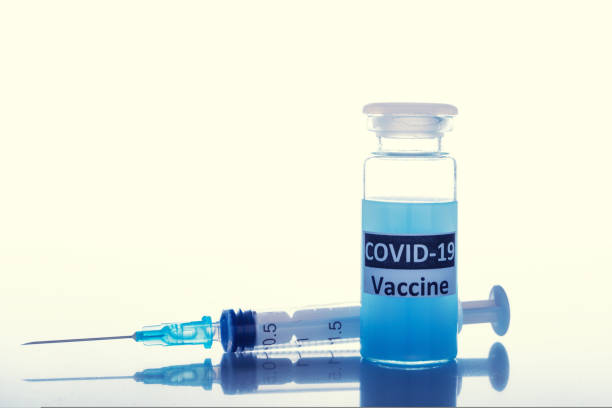 istock coronavirus vaccine with syringe 1425042773