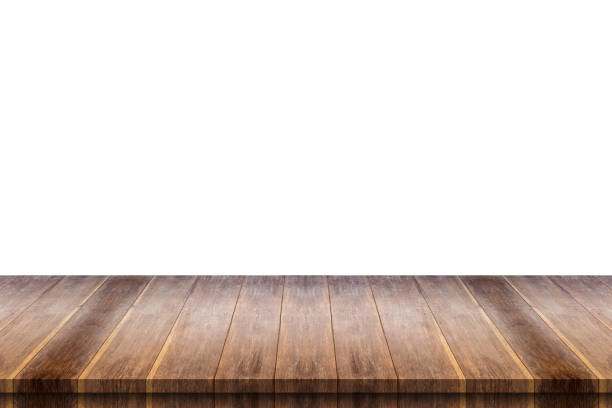 istock Empty wooden table top isolated on white background for product display 1425044615