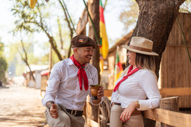 istock Gaucho couple drinking chimarrao at the farroupilha camp 1425048687