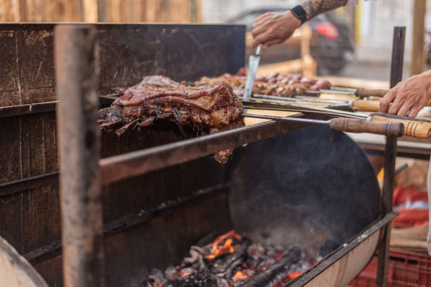 istock Gaucho making barbecue at the farroupilha camp 1425048792