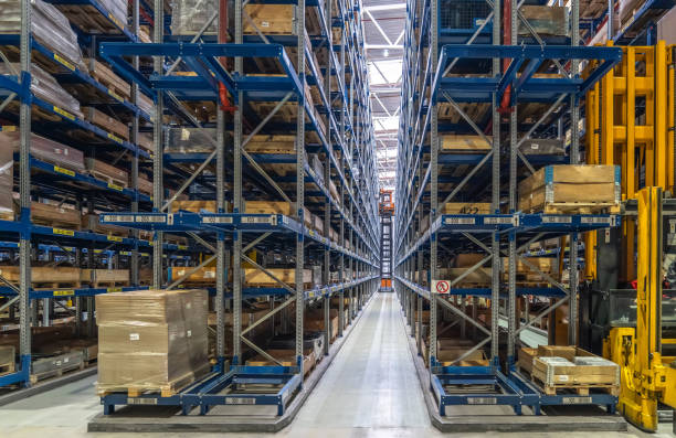 istock Cargo warehouse or storehouse with many shelves. Goods distribution concept 1425048867